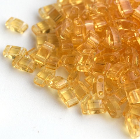 HTL-0132 Бисер Миюки халф тила/Miyuki Half Tila Transparent Light Topaz