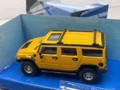 Hummer H2 SUV yellow Cararama 1:43