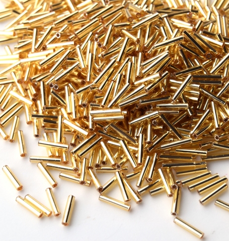 Стеклярус Тохо 9 мм 0022 светло золотистый