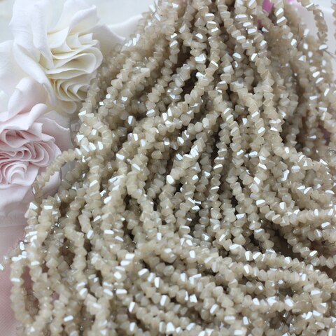 Хрусталь (стекло) граненный, бежевый 4*3 мм, 1 нить, С059