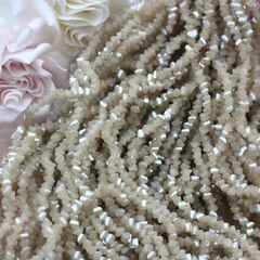 Хрусталь (стекло) граненный, бежевый 4*3 мм, 1 нить, С059