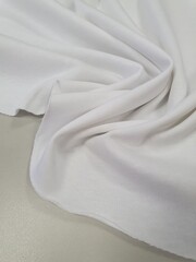 №833 Белая Кулирная гладь 240 гр 0,35 м (с дефектом)