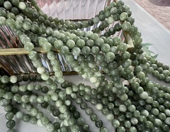 Нить бусин из тонированного кварца 8мм, гладкие