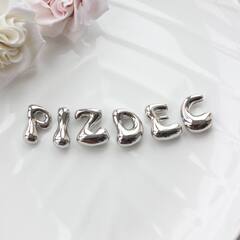Слово из букв PIZDEC в серебре
