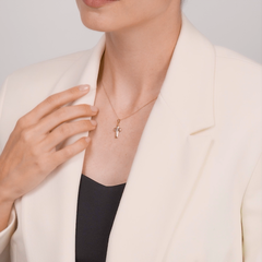 121324 - Крестик из комбинированного золота 585пр