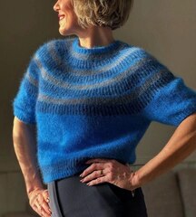 Описание по вязанию топа спицами "Tanne"