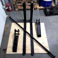 Вилы откидные паллетные Impuls PF2000 на ковш JCB 3CX/4CX