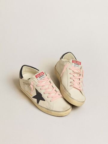 Super Star LTD with blue leather star and decorative studs