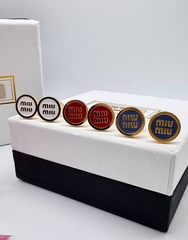 sergi-pusety-miumiu-kruglye-s-ehmalyu