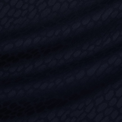 Костюмная ткань из шерсти с эластаном с леопардовыми пятнами в тёмно-синем цвете
