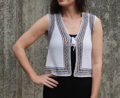 Описание по вязанию жилета спицами "Folk"