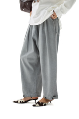 Серые хлопковые брюки-бананы с защипами