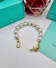 braslet-s-zhemchugom-titan-by-tiffany-farrell-williams