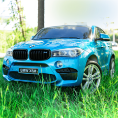 Детский двухместный электромобиль "BMW X6M" JJ2199 12V