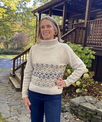 Описание по вязанию свитера спицами "Western Rose"