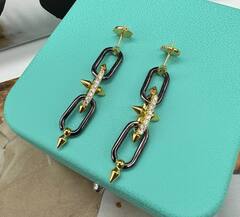 sergi-iz-dvuhcvetnogo-metalla-chernyj-zoloto-s-shipami-v-stile-tiffani-farrell-williams