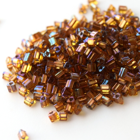 Бисер японский TOHO Triangle треугольный 11/0 0278 темно-золотистый радужный