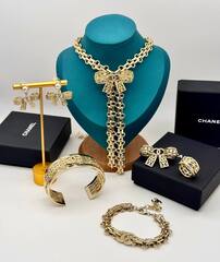 45274-braslet-cep-s-podveskoj-sumochka-by-chanel