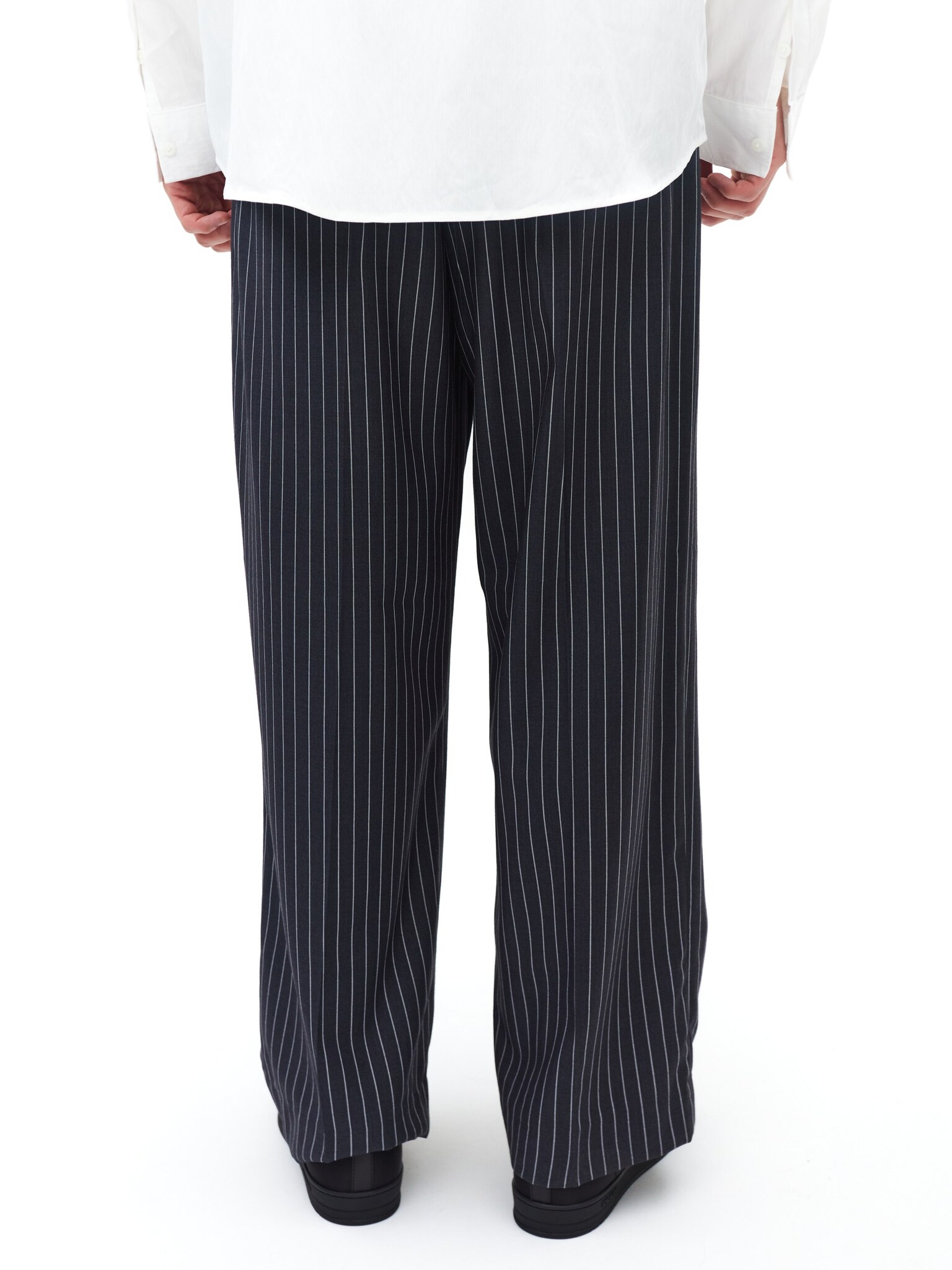 Черные брюки в полоску Fleur с защипами