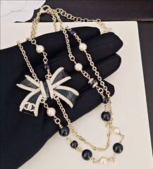 Колье с бантом CHANEL с жемчугом и черной эмалью двухрядное