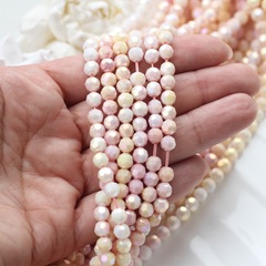 Бусины стеклянные нежный абрикос круглые 6 мм, К145