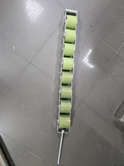 Прижимная роликовая батарея поручня эскалатора