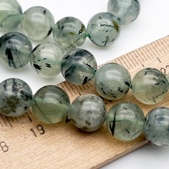 Пренит бусины, диаметр 9,5-9,8 мм, цена за 10 шт (1/4 нити)