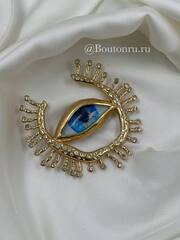 Брошь Скиап. золотистая в форме глаза с подковой из ресниц со стразами