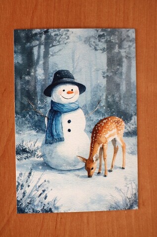 Снеговик и олененок