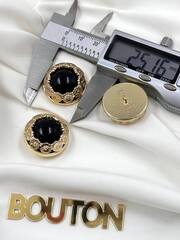 Пуговицы золотистые объемные с черным камнем и обрамлением в форме цветочков