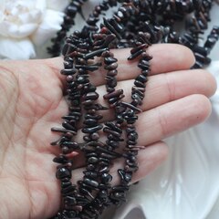 Коралл тёмно-коричневый (имитация), бусины 3x5-6x10 мм, 1/2 нити, К010
