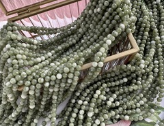 Нить бусин из тонированного кварца 6мм, гладкие