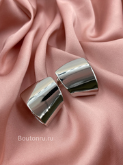 Серьги серебристые плоские изогнутые