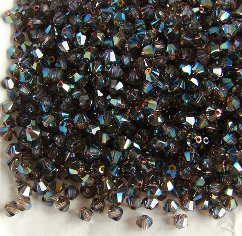 Биконусы 4мм Сваровски Переливающийся зеленый / Iridescent Green