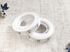 Размерники полиэстер 54, 10х25мм в рулоне 300 шт (+/-30шт).