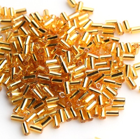 Стеклярус Тохо 3 мм 0022B золотистый