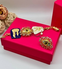 Браслет-цепь SCHIAPARELLI с подвесками в позолоте