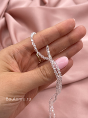 Бусины стеклянные биконусы на нити прозрачные