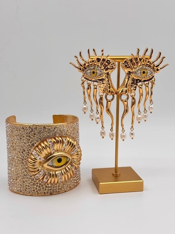 Серьги и браслет Schiaparelli глаза
