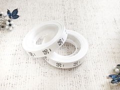 Размерники полиэстер 56, 10х25мм в рулоне 500 шт.