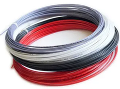 Теннисная струна Wilson Revolve Orange - 1.3 Reel (1 комплект)