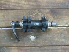 Втулка передняя Novatec DS11SB 100x9QR Disc