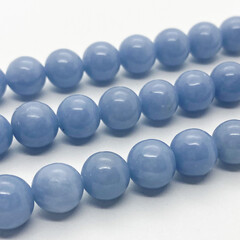 Ангелит бусины, диаметр 9,8-10 мм, цена за 9 шт (1/4 нити)
