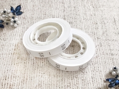 Размерники полиэстер 58, 10х25мм в рулоне 300 шт (+/-30шт).