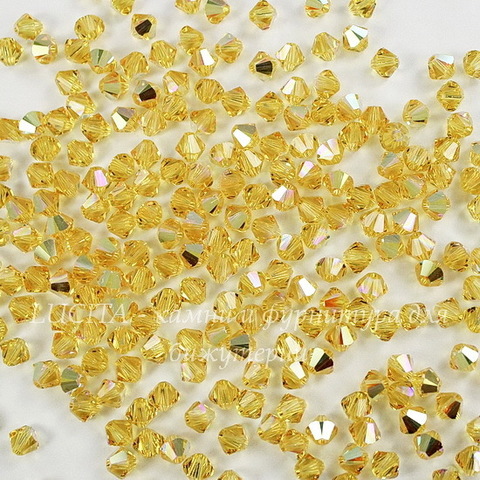 5328 Бусина - биконус Сваровски Light Topaz AB 4 мм, 10 штук
