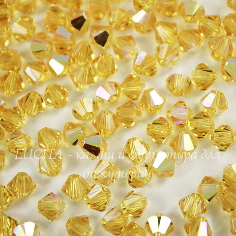 5328 Бусина - биконус Сваровски Light Topaz AB 4 мм, 10 штук