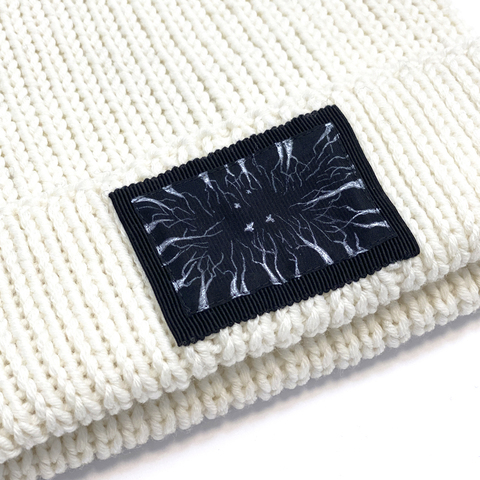 Шапка из шерсти мериноса молочного цвета