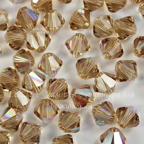 5328 Бусина - биконус Сваровски Light Colorado Topaz Shimmer 6 мм, 5 штук