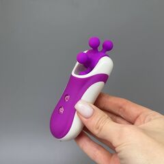 Фиолетовый оросимулятор Clitella со сменными насадками для вращения