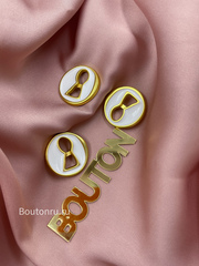 Пуговицы Скиапар. золотистые с белой эмалью 